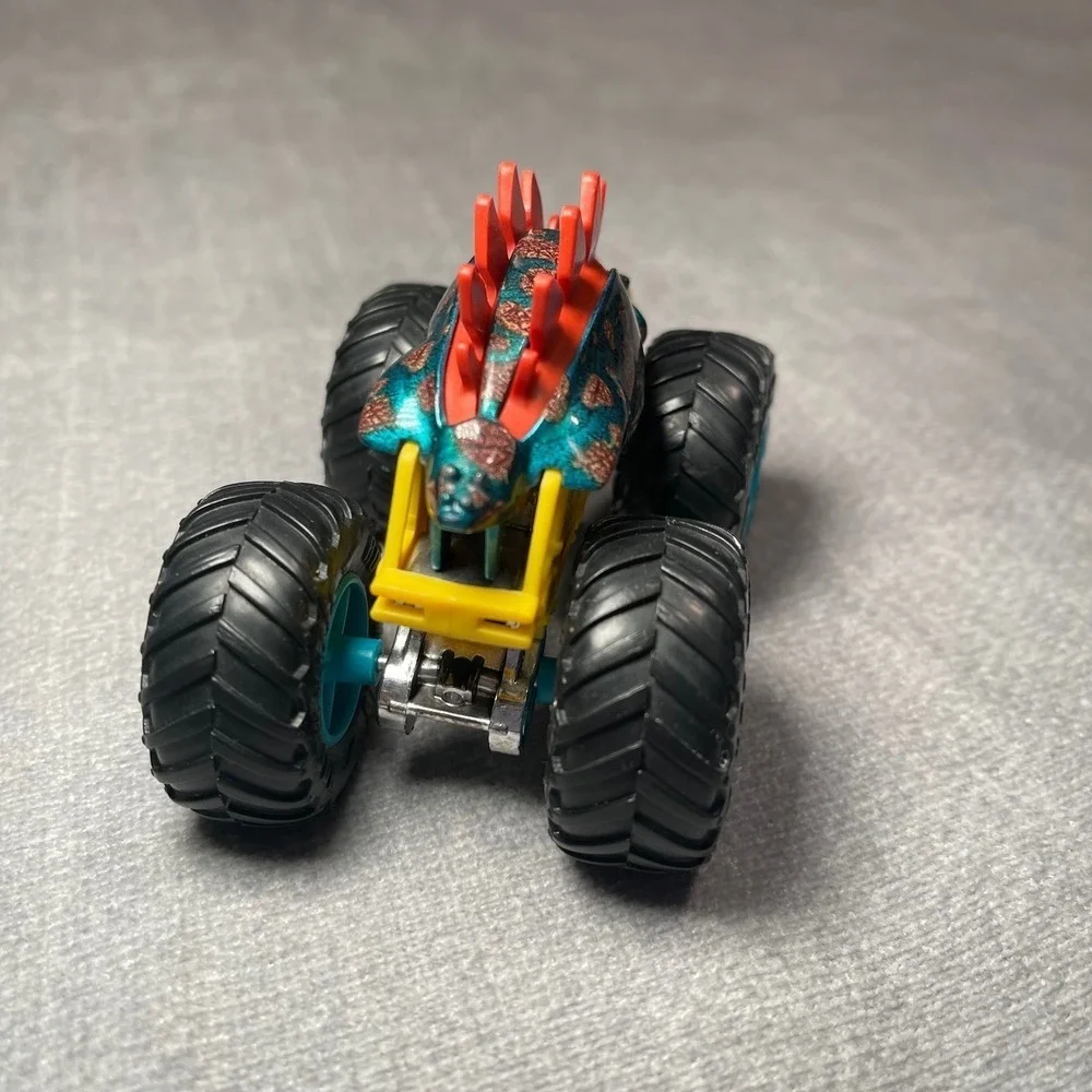 Hot Wheels Monster Truck Dinosaur Styracosaurus Teal Green Red Yellow Toy Kids